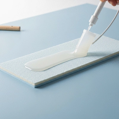 Product photography of tufted rug adhesive